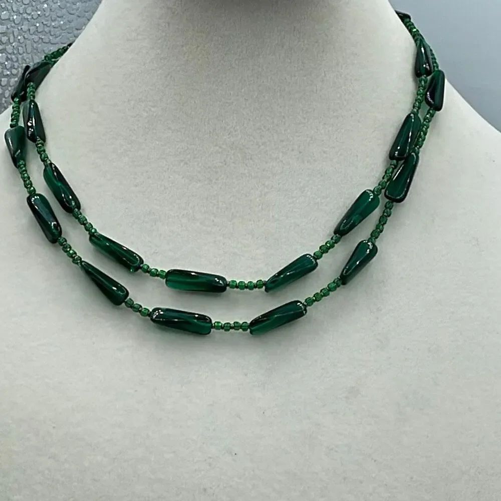 Vintage Set of two green glass beaded necklaces.